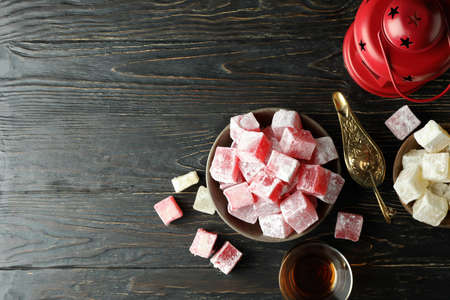Concept of tasty food with turkish delight on wooden tableの写真素材