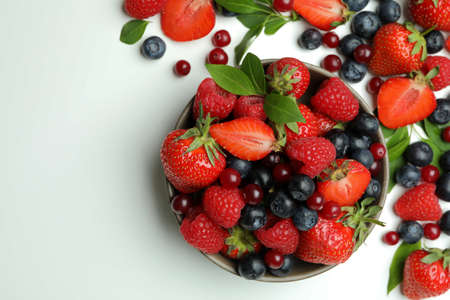 Delicious fresh berry mix on white backgroundの写真素材