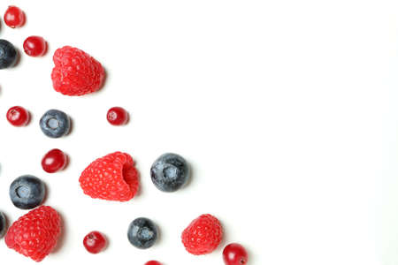 Delicious fresh berry mix on white backgroundの写真素材