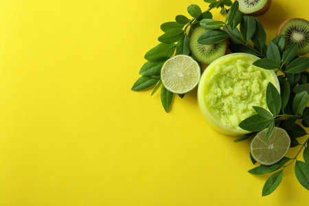 Skin care scrub concept on yellow background