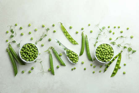 Fresh green pea on white textured backgroundの写真素材