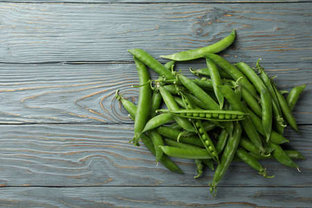 Fresh green pea on gray wooden tableの写真素材
