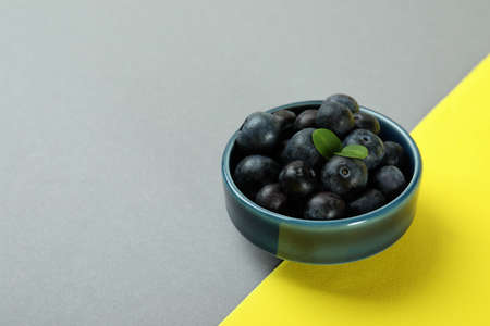 Fresh berry concept with blueberry on two tone backgroundの写真素材