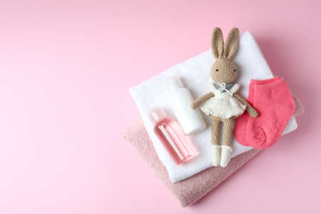 Different baby hygiene accessories on pink backgroundの写真素材