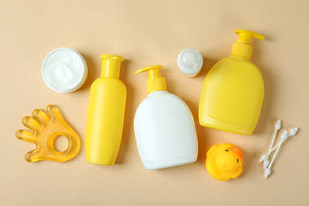 Different baby hygiene accessories on beige backgroundの写真素材