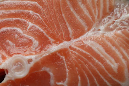 Fresh raw salmon texture on whole background, close upの写真素材