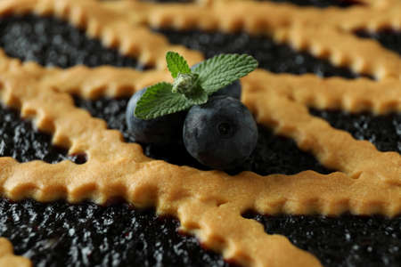 Delicious blueberry pie with berries and mint, close upの写真素材