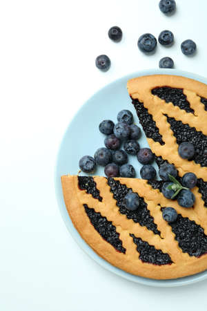 Plate with blueberry pie on white backgroundの写真素材