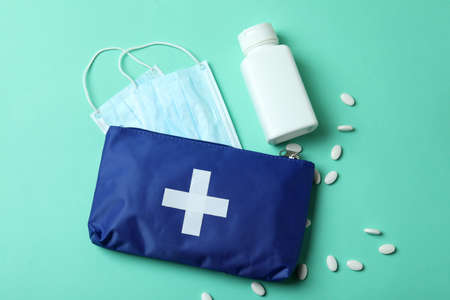First aid medical kit on mint backgroundの写真素材