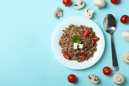 Concept of tasty eating with buckwheat on blue backgroundの写真素材