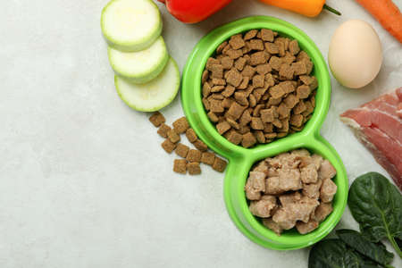Concept of organic pet food on white textured backgroundの写真素材