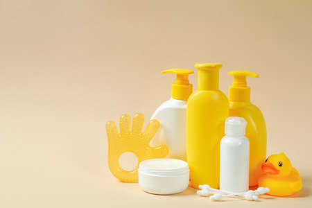 Different baby hygiene accessories on beige backgroundの写真素材