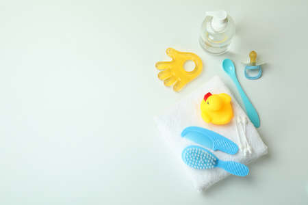 Different baby hygiene accessories on white background