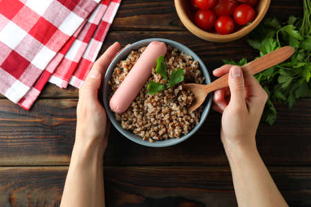 Concept of tasty eating with buckwheat on wooden tableの写真素材
