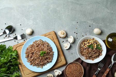 Concept of tasty eating with buckwheat on gray textured tableの写真素材