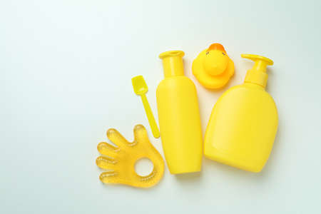 Different baby hygiene accessories on white background