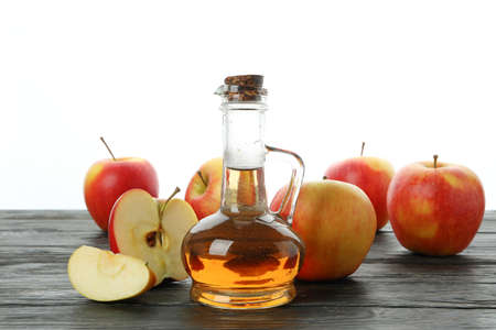 Homemade apple vinegar isolated on white backgroundの写真素材