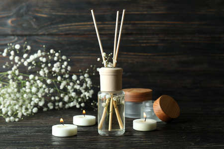 Aromatic concept with diffuser on wooden table