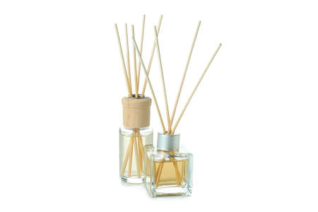 Diffuser bottles with sticks isolated on white background