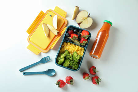 Lunch box with tasty food on white backgroundの写真素材
