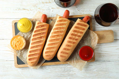Concept of tasty food with french hot dog