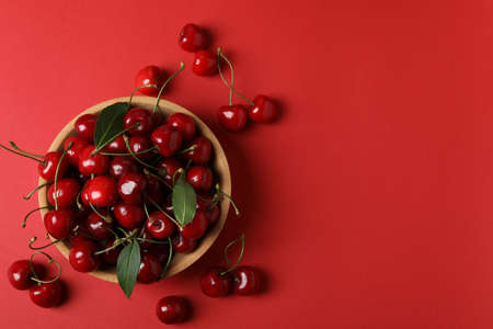 Concept of sweet berry with red cherry