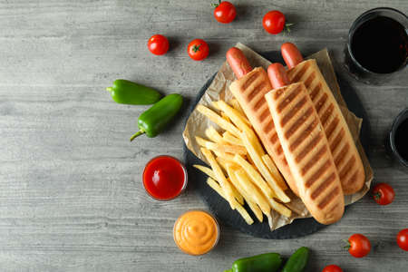 Concept of tasty food with french hot dog