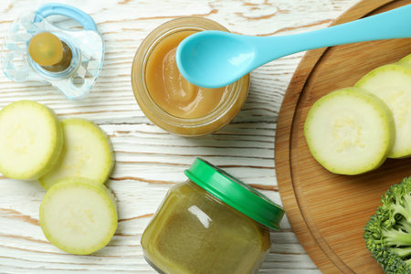 Concept of baby food on wooden tableの写真素材