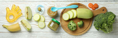 Concept of baby food on wooden tableの写真素材
