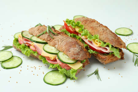 Ciabatta sandwiches and ingredients on white backgroundの写真素材