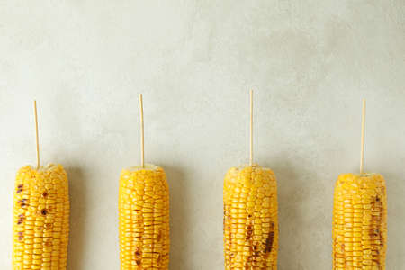 Concept of tasty food with grilled corn