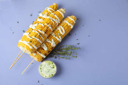 Concept of tasty food with grilled corn