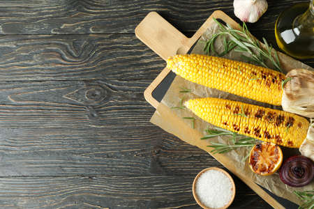 Concept of tasty food with grilled corn