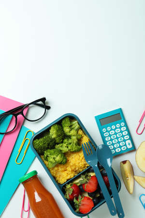 Study concept with lunch box on white backgroundの写真素材