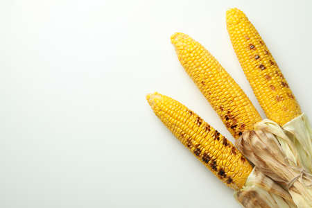 Concept of tasty food with grilled cornの写真素材