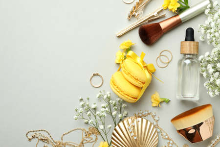 Female accessories and macaroons on light gray backgroundの写真素材