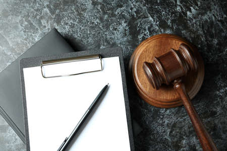 Law concept with judge gavel on black smokey tableの写真素材