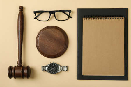 Law concept with judge gavel on beige backgroundの写真素材