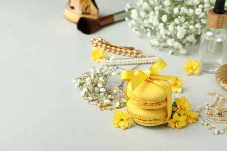 Female accessories and macaroons on light gray backgroundの写真素材