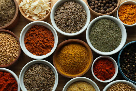 Set of different spices in sauce bowlsの写真素材