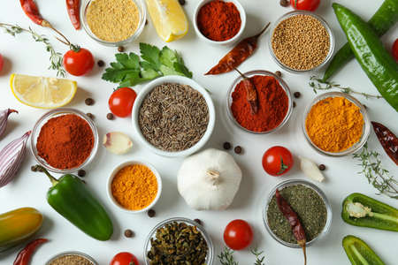 Concept of aromatic spices on white background