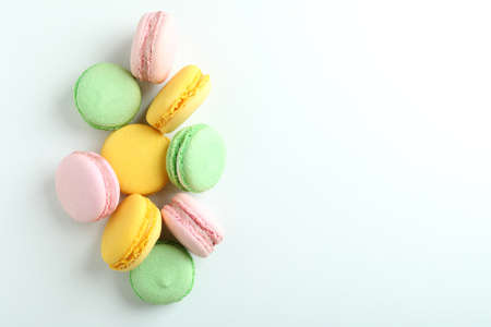 Concept of tasty dessert with macaroons on white backgroundの写真素材