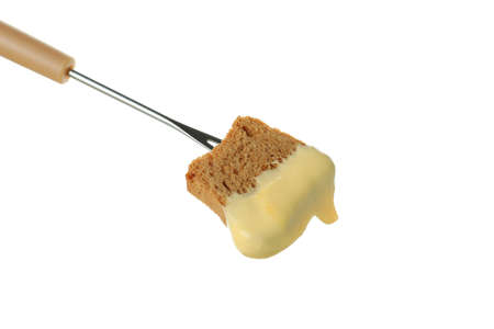 Fork with crouton and fondue isolated on white backgroundの写真素材