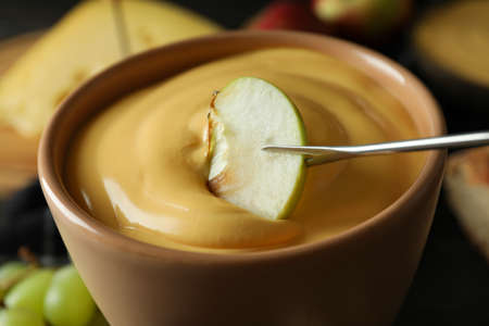 Concept of delicious food with fondue, close upの写真素材
