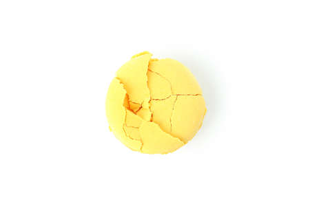 Yellow tasty macaroon isolated on white background