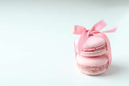 Concept of tasty dessert with macaroons on white backgroundの写真素材