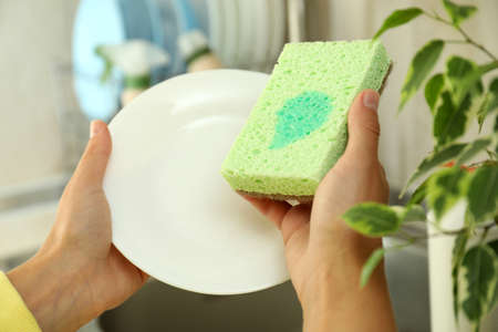 Concept of dishwashing on kitchen basin backgroundの写真素材