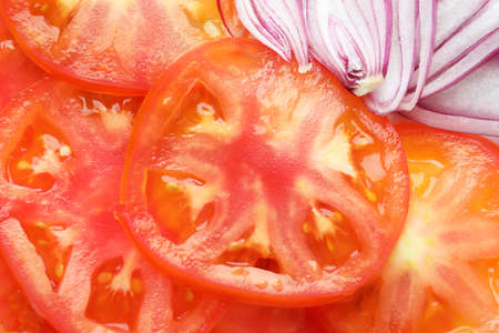 Tomato carpaccio all over background, close upの写真素材