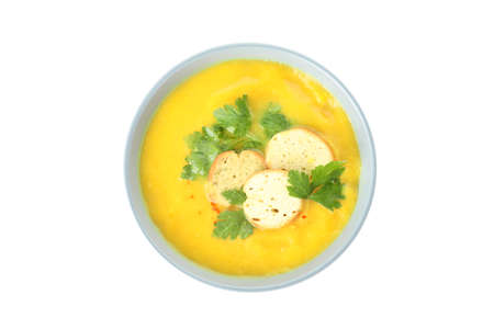 Plate of pumpkin soup isolated on white backgroundの写真素材