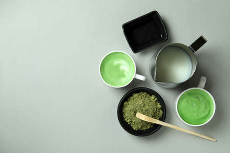 Matcha latte and accessories for making on light gray backgroundの写真素材